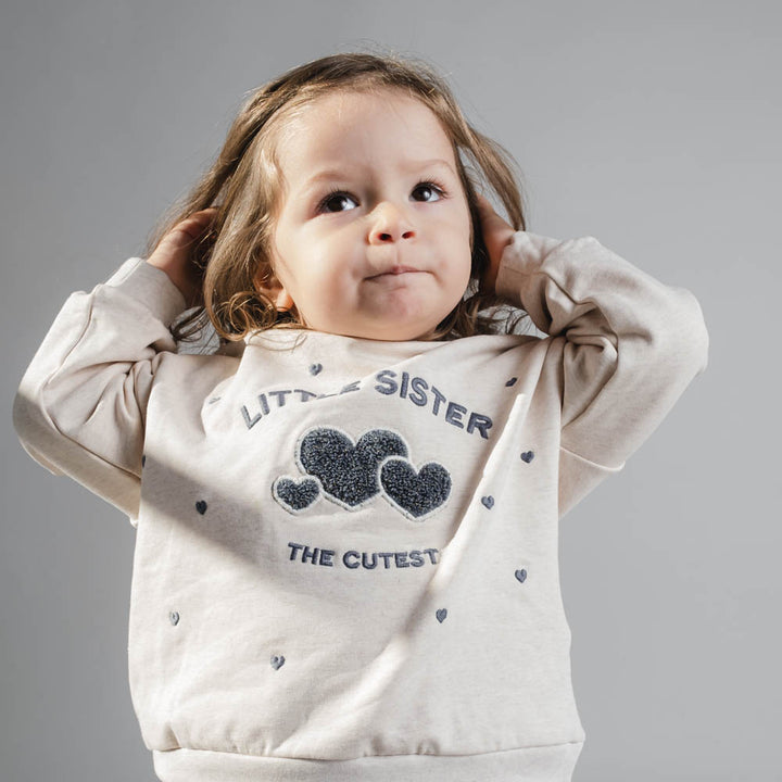 Finley-Sweatshirt für kleine Schwester – Helles Creme-Melange